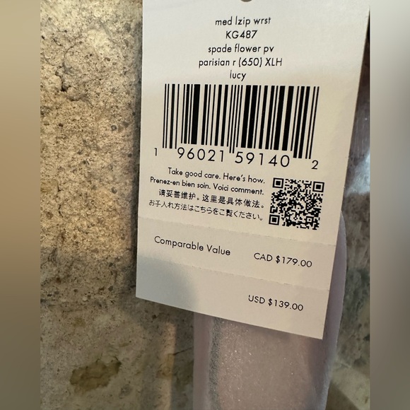 Kate Spade medium zip wristlet Lucy patterned in pink - Picture 5 of 11